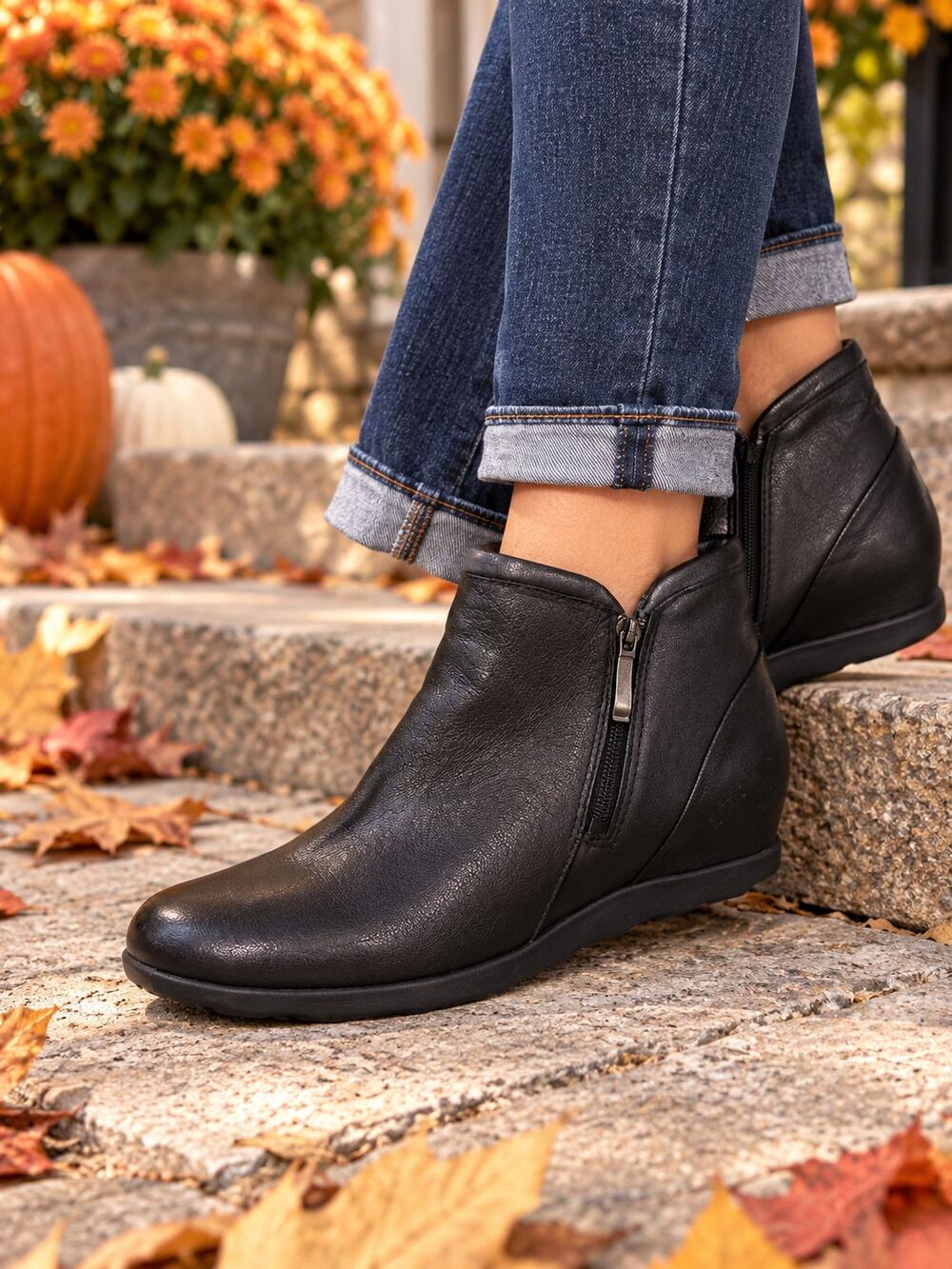 Dansko Miki ankle boots size 10.5 side zipper and a comfortable low wedge heel.
